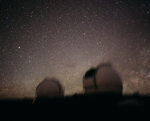Keck telescopes with stars behind